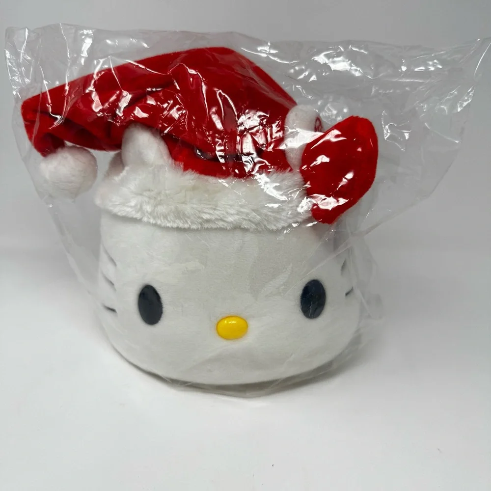NWT’ HELLO KITTY Dancing Santa Moving Hat! Plays 5 songs!